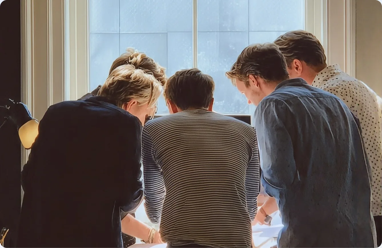 Leadership team reviewing information in a boardroom